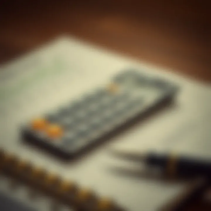 A calculator with a financial journal and pen
